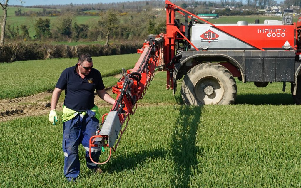 Paul Murry checks the nozzles before treating a field of winter barley