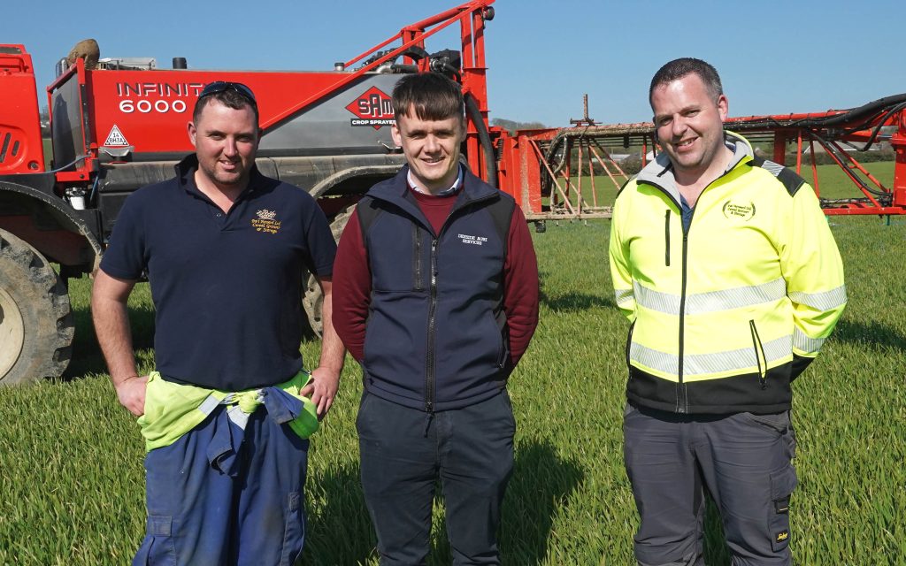 L-r: Paul Murry (sprayer operator); Alan McEvoy (Deeside Agri); Ian Howard