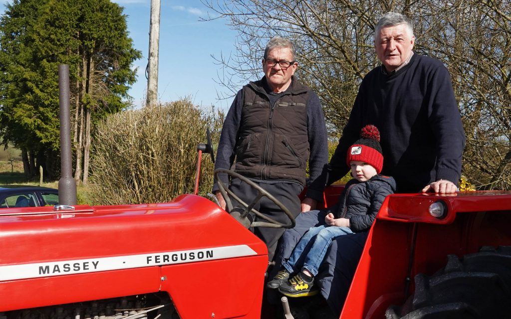 Local mechanic Jimmy O'Connor (right) had helped restore the Kelleher's MF165 and had brought his own along, complete with grandson