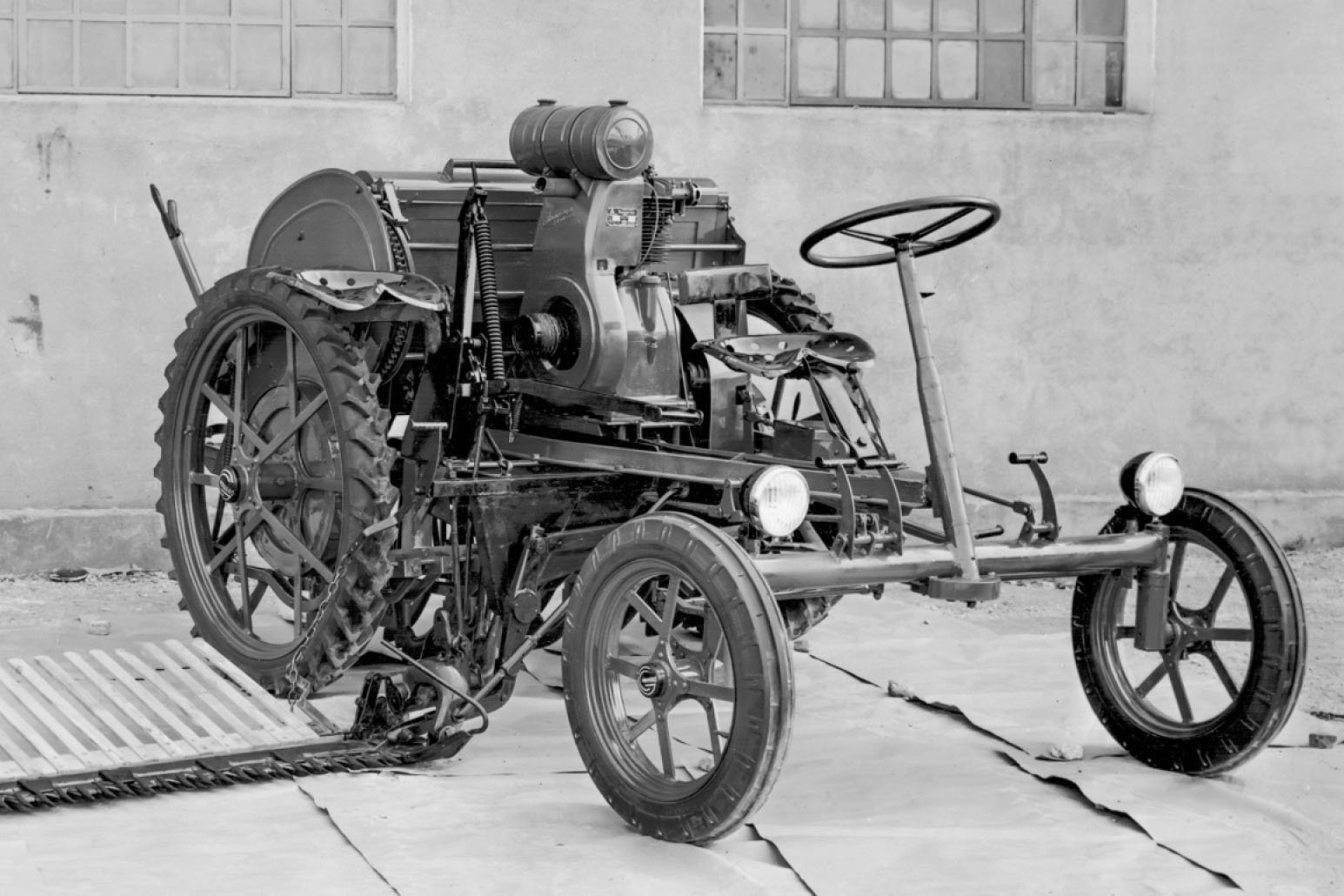 The first Carraro 'tractor' was a mechanised seeder with side mounted finger bar mower in 1932