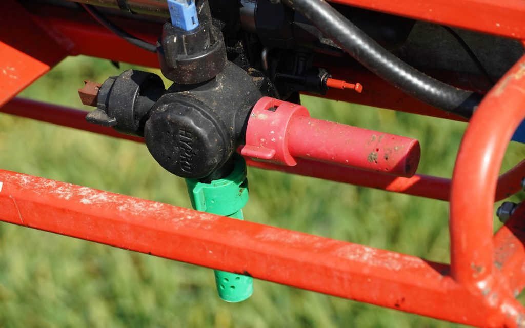 Application nozzles are designed to produce larger droplets that penetrate the crop canopy