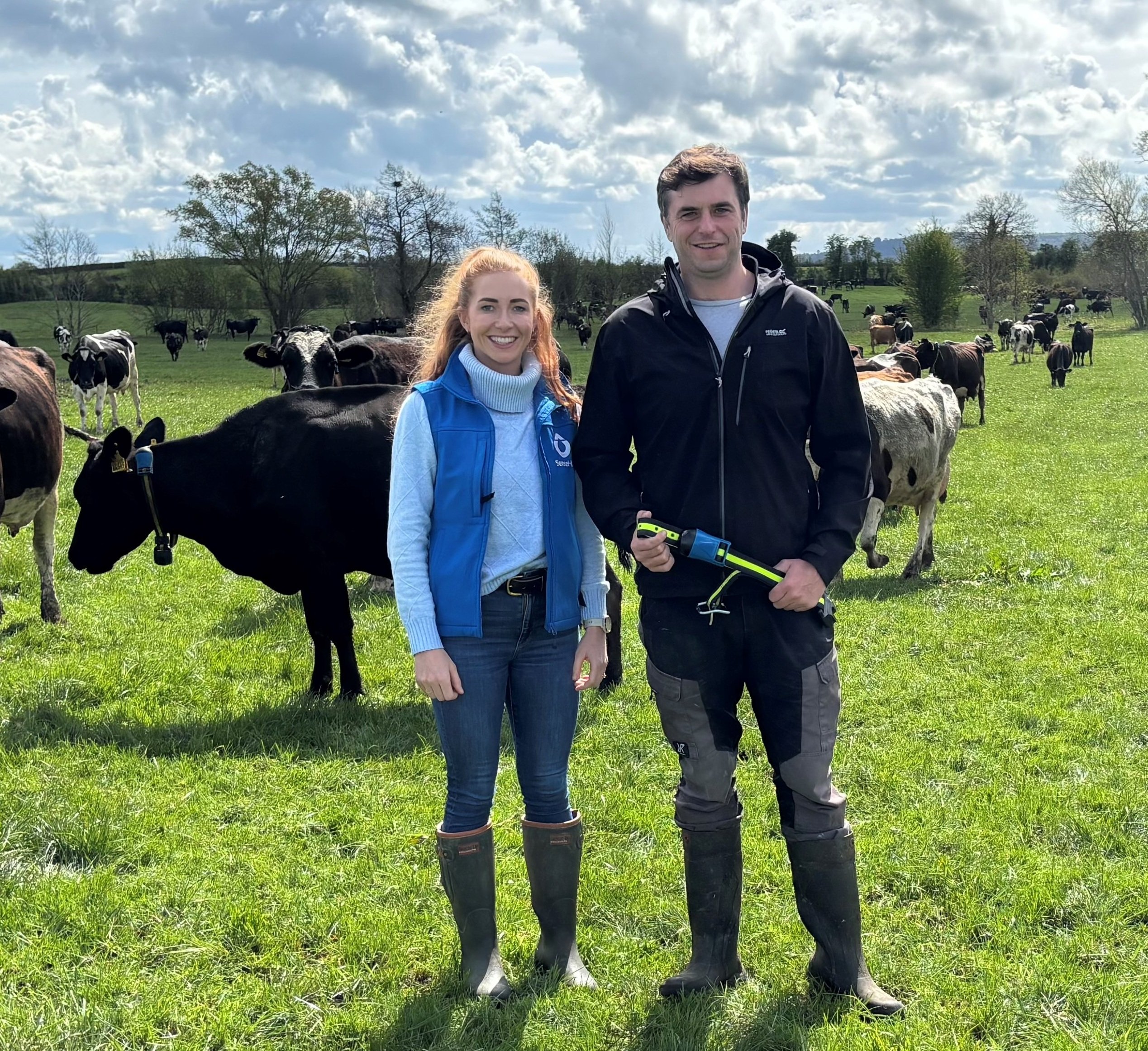 Customer Success &amp; Technical Manager, MSD Animal Health SenseHub Technology, Catherine Heffernan alongside farmer Liam Hyland (Ballacolla, Co Laois), recipient of the 300,000th SenseHub collar sold by MSD Animal Health in Ireland.