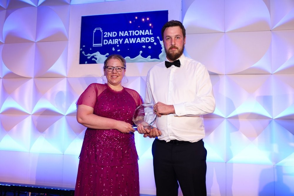 Claire Bailey Archibald, area sales manager, Germinal presents the Germinal Responsible Dairy Grassland Manager of the year award 2024 to Martin Ryan, dairy farmer, Tipperary at the 2024 National Dairy Awards