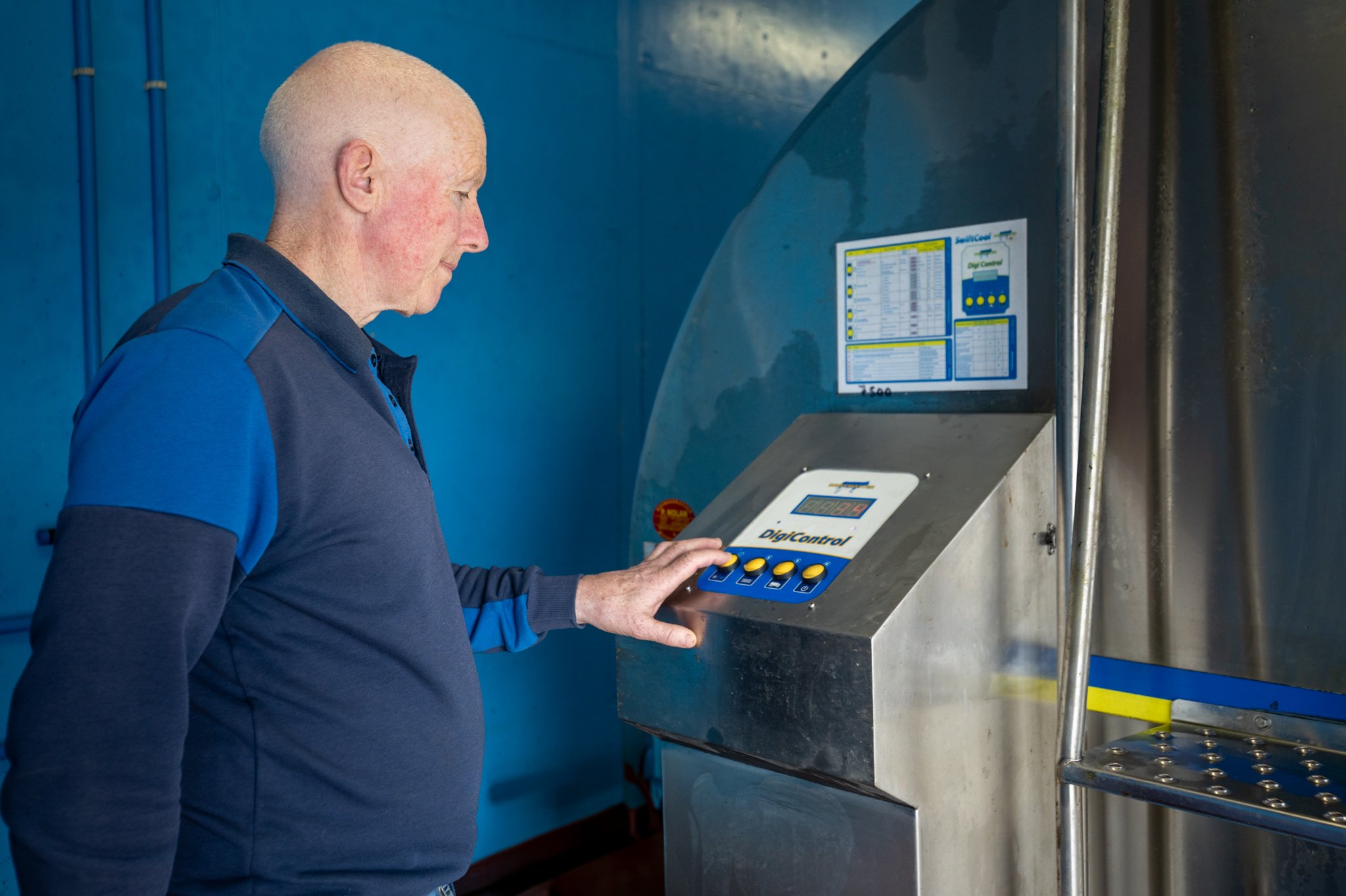 Michael Kelliher with his Dairymaster SwiftCool milk tank. Source: Dairymaster
