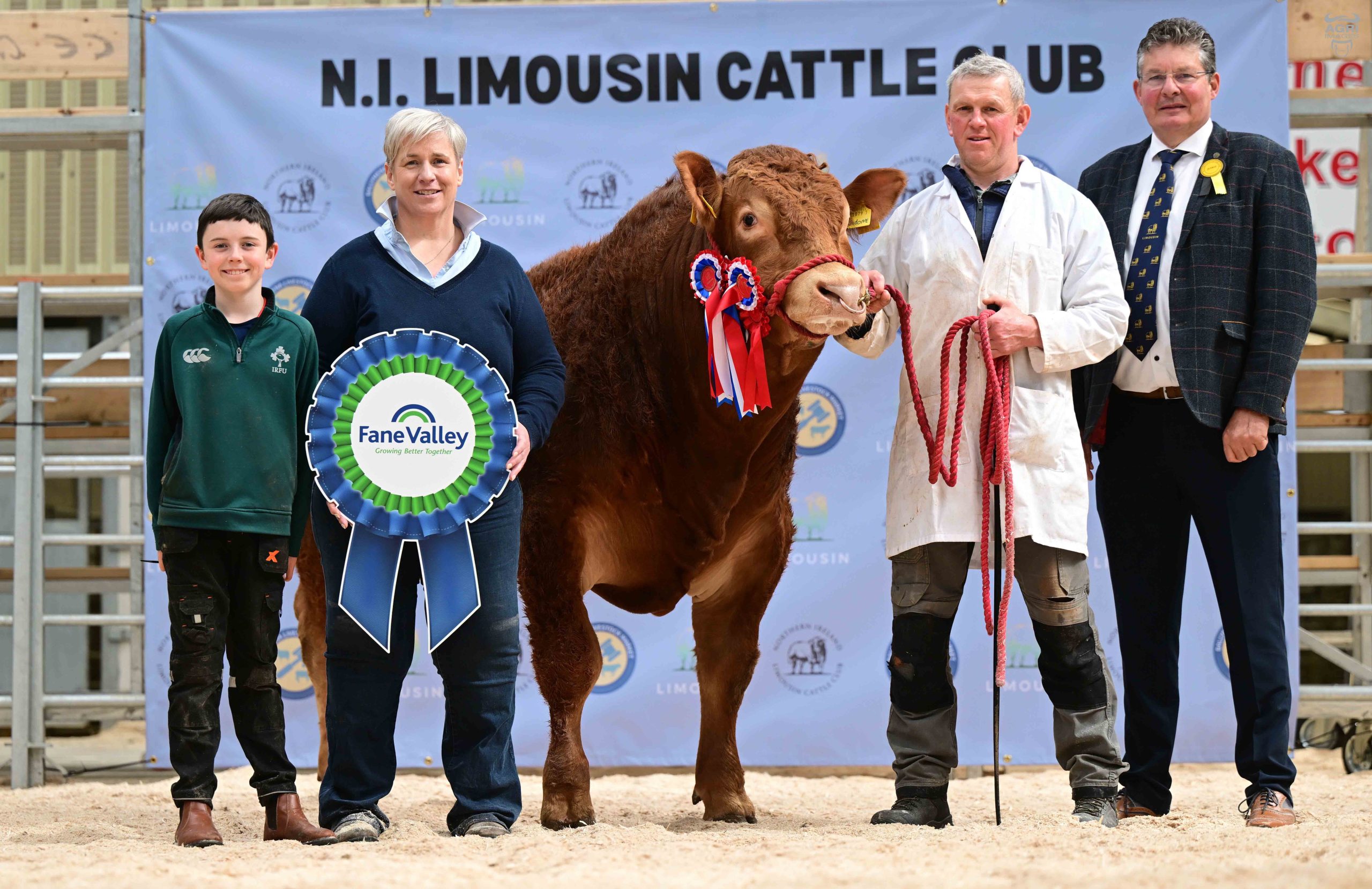 Leanne Workman, Fane Valley, and judge Trevor Shields, congratulate Michael and Kian McKeefry on winning the supreme overall championship with Eniver Undone. Source: Agri-Images