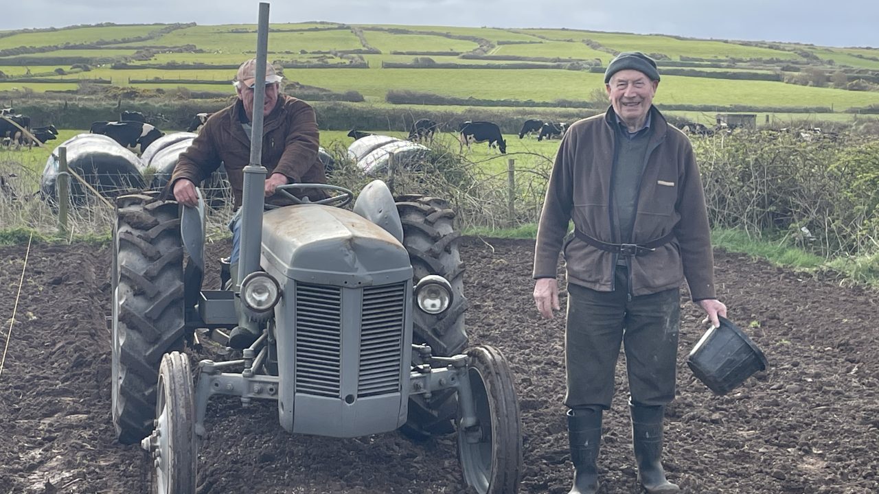 One of the images from the calendar showing farmers setting potatoes in west Kerry. Source: Dinny Galvin