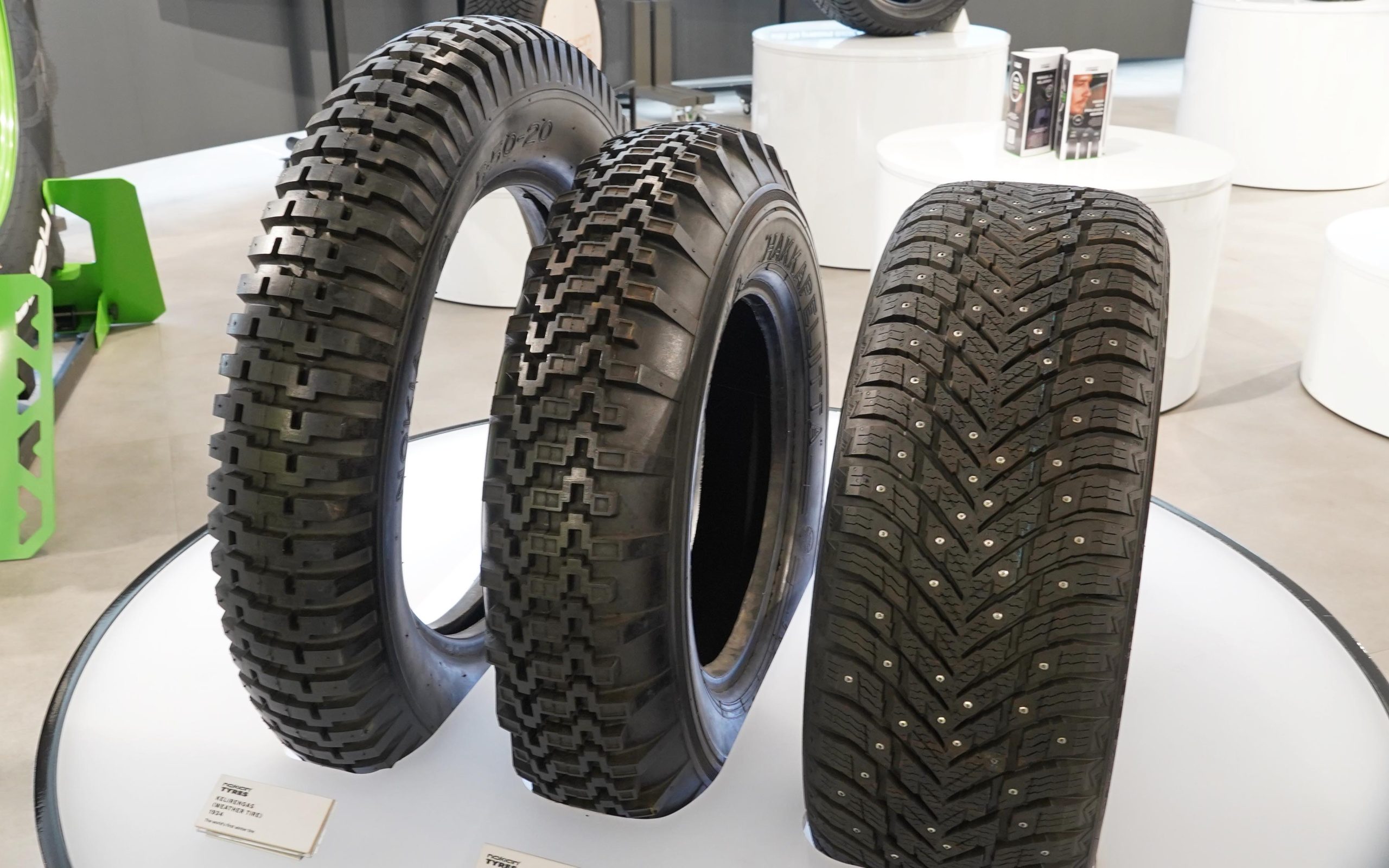 Nokian Tyres through the ages: (l-r) reconstruction of its first tyre, its first winter tyre, and a modern studded winter tyre