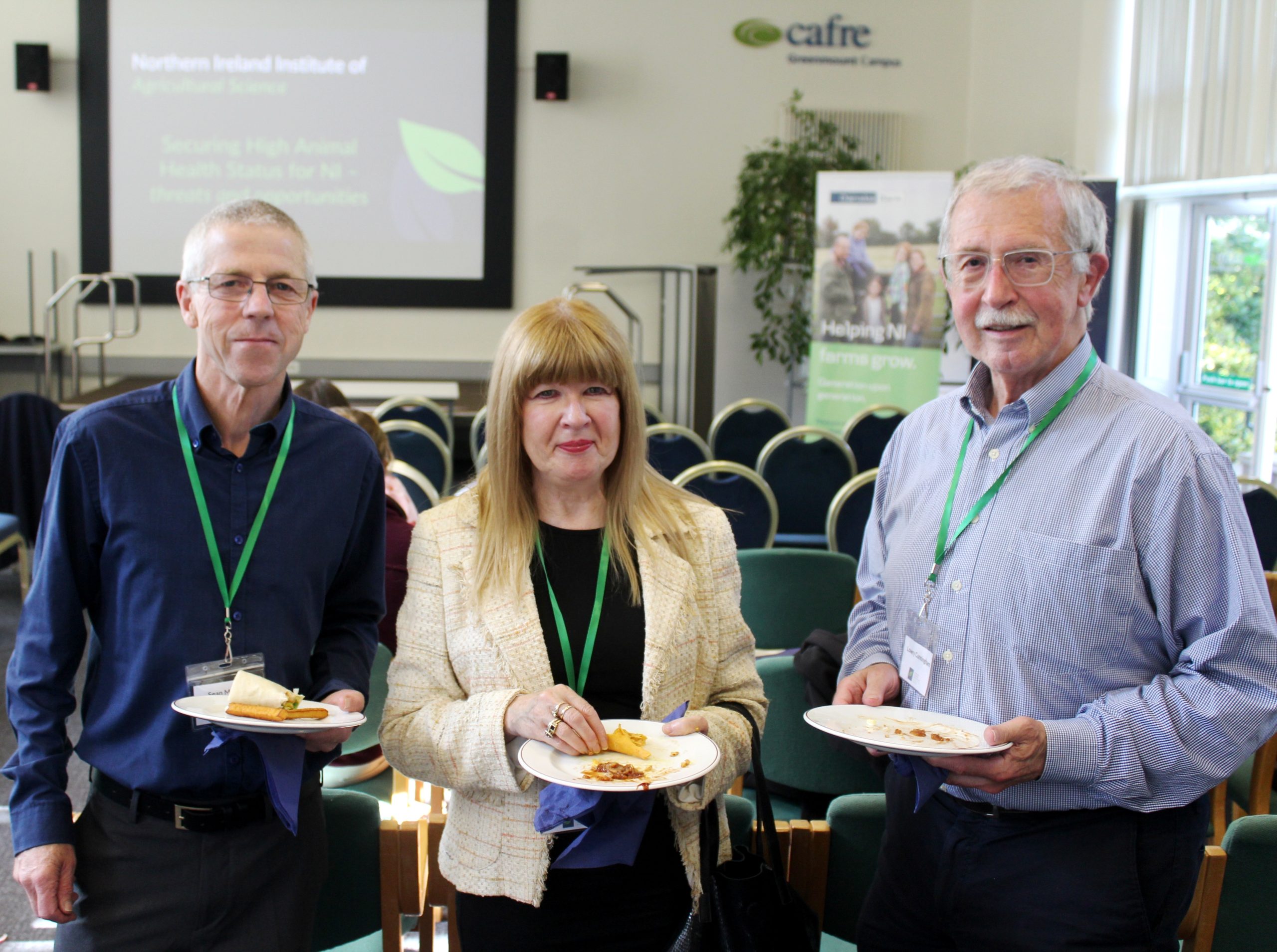 Chatting at the NIIAS conference, Institute members (l-r) Sean McIntyre, Valerie Westfield, and Lowry Cunningham