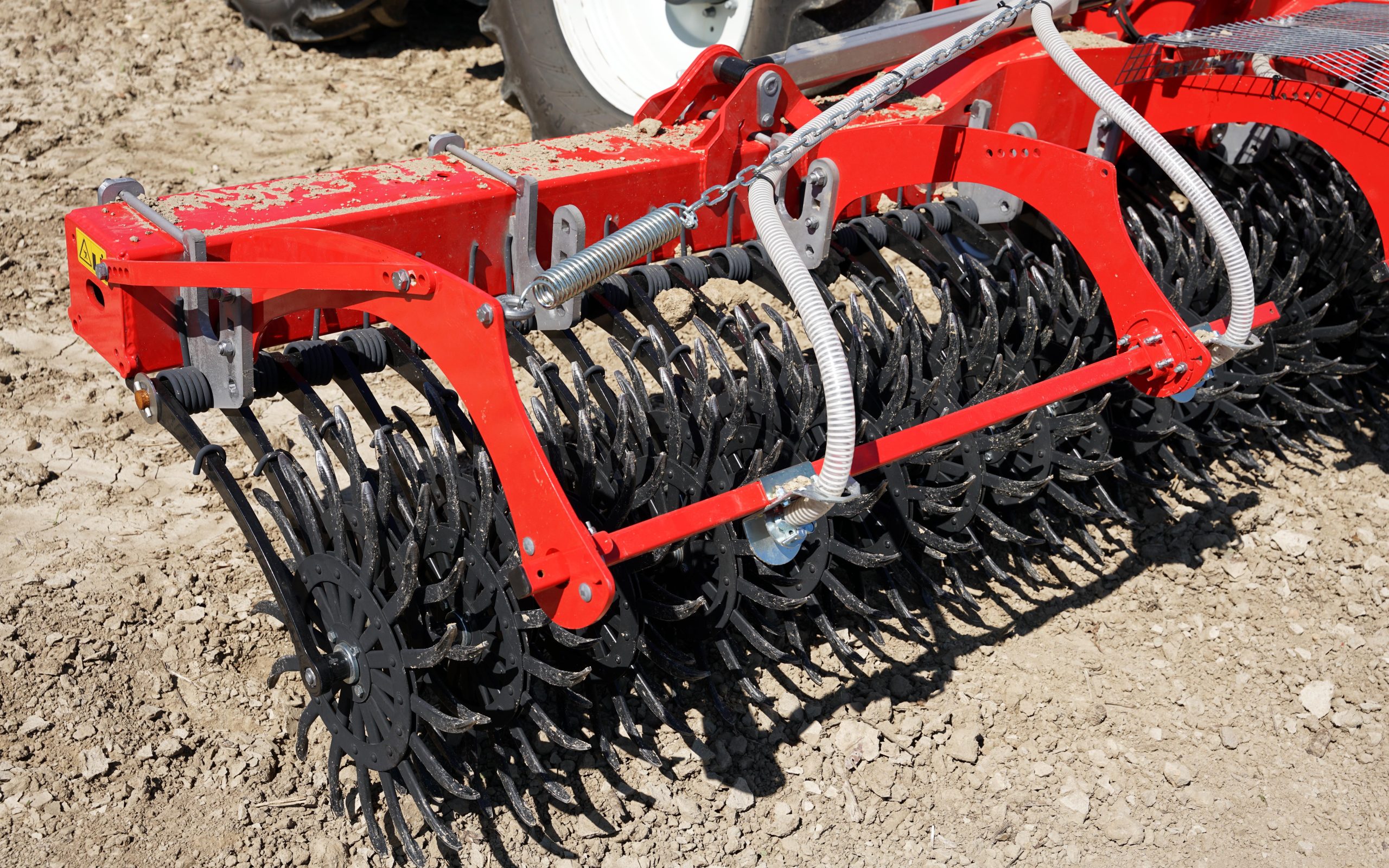 Sun wheel implements will keep the layer of soil open for rain to penetrate.