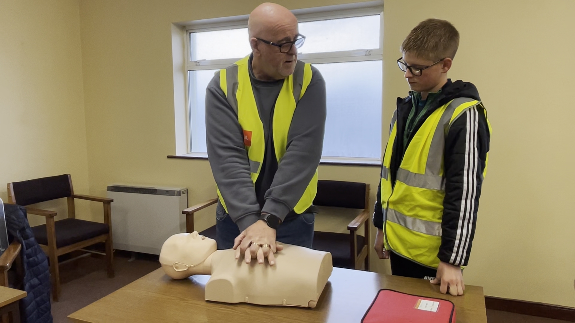 Stephen Keane of Blackwood Training teaching Sean Dalton how to perform CPR