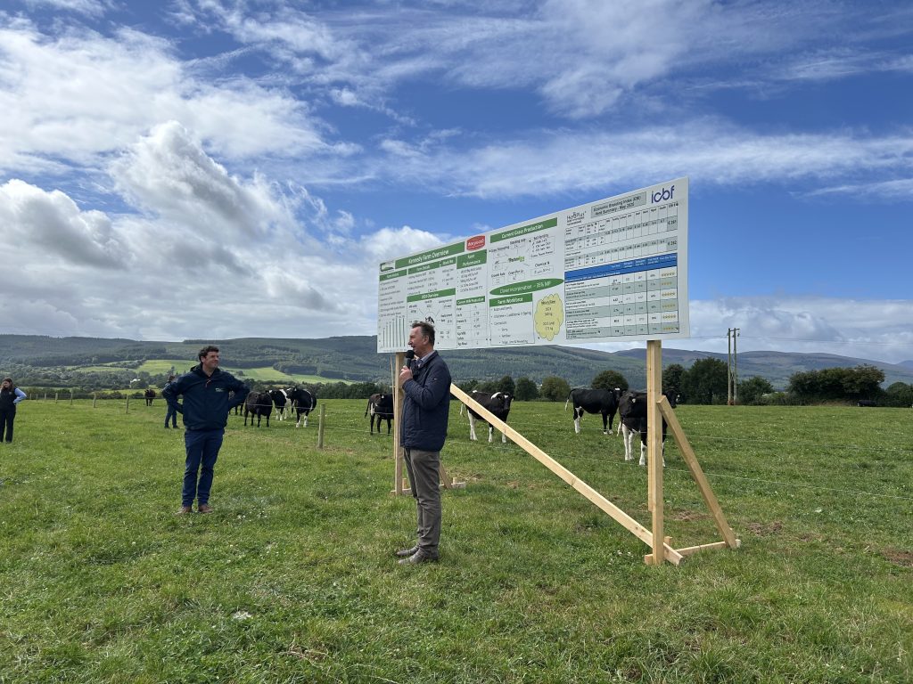 Aidan Kennedy talking to attendees about his farm system