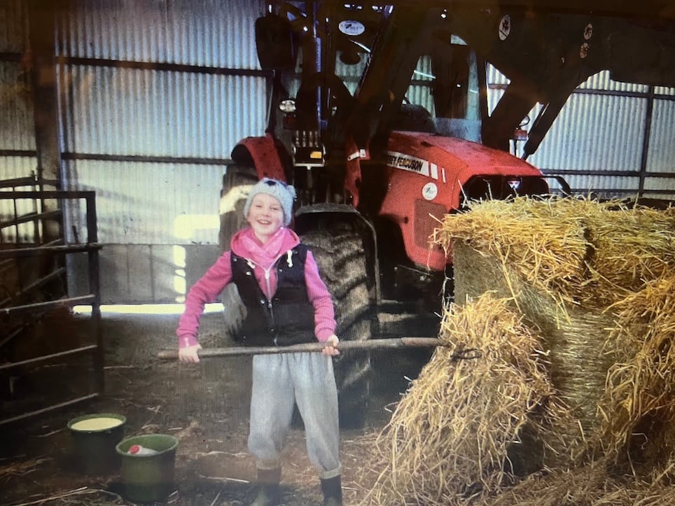 Katelyn helped out on the farm from an early age.