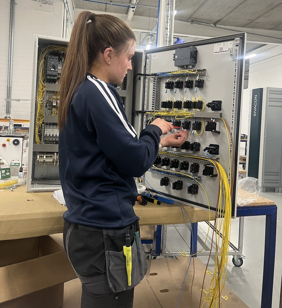 Katelyn busy at work as an apprentice electrician