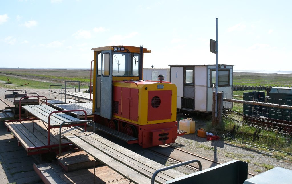 A few of the little trains or 'lorries' parked up on the Hallig ready for use by the residents