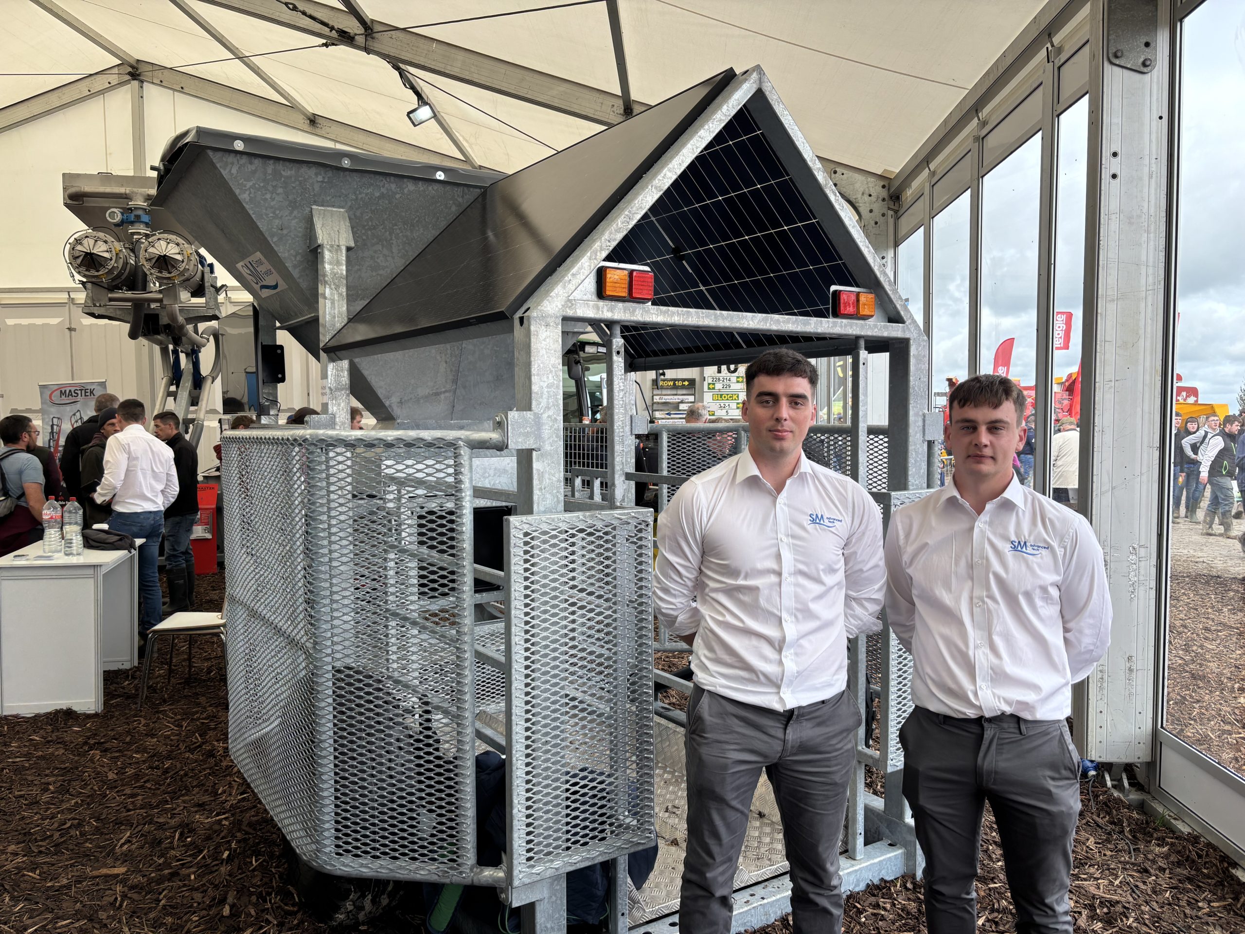 Mairtin Gannon and Shane Gaule from Co. Kilkenny showcasing their automated mobile animal feeder and weigh station at Ploughing 2025