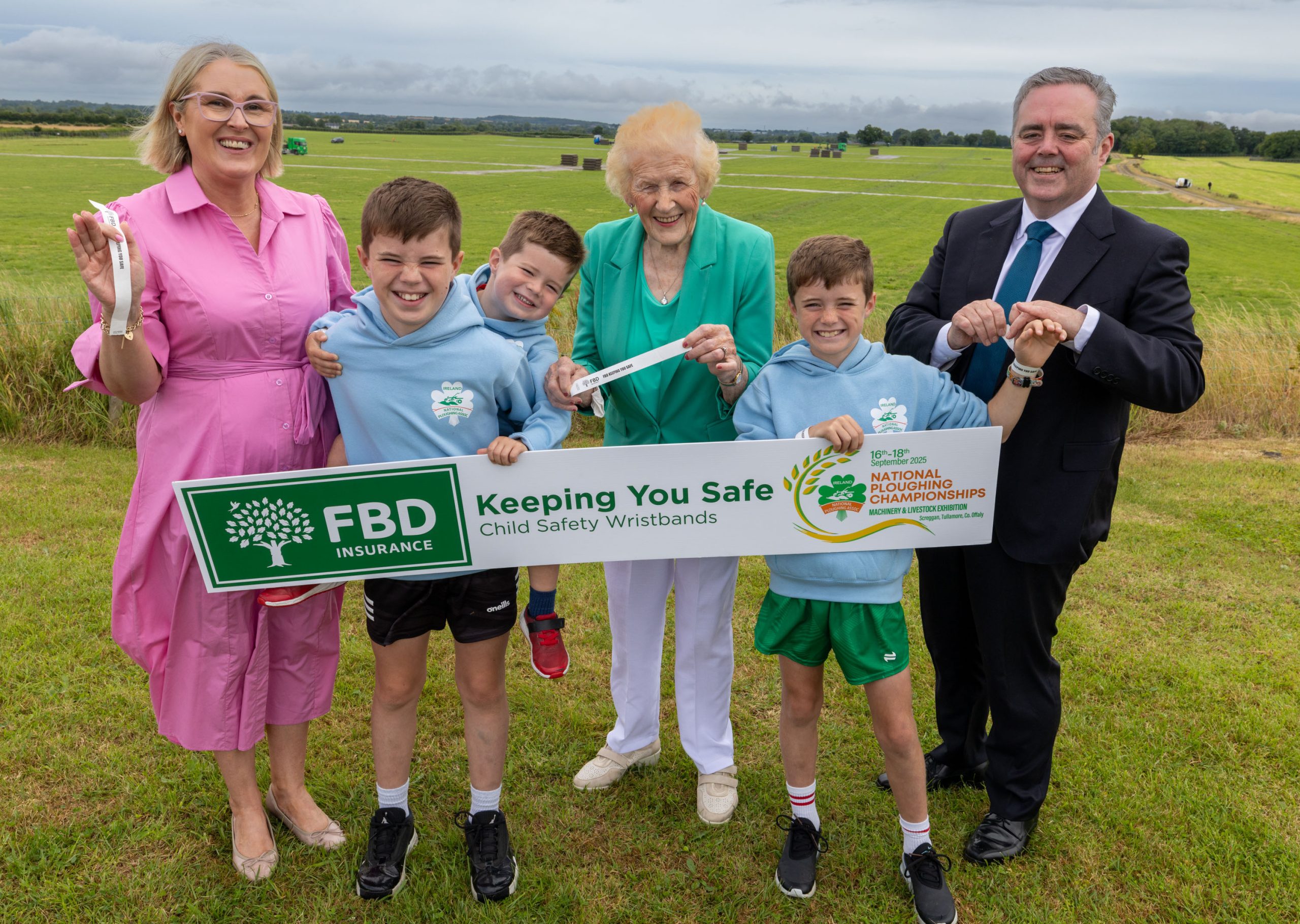 NPA managing director Anna May McHugh and Maureen O’Meara and Tomás O’Midheach from FBD with Fergus, Liam and Sean Conroy launching the FBD Children’s wristbands on the site of the 2025 National Ploughing Championships. Source: Alf Harvey