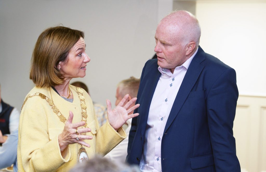 Mayor of Ards and North Down, Cllr. Gillian McCollum, in conversation with Niall Matthews, chairperson of Lakeland Dairies. Image source: Barry Cronin