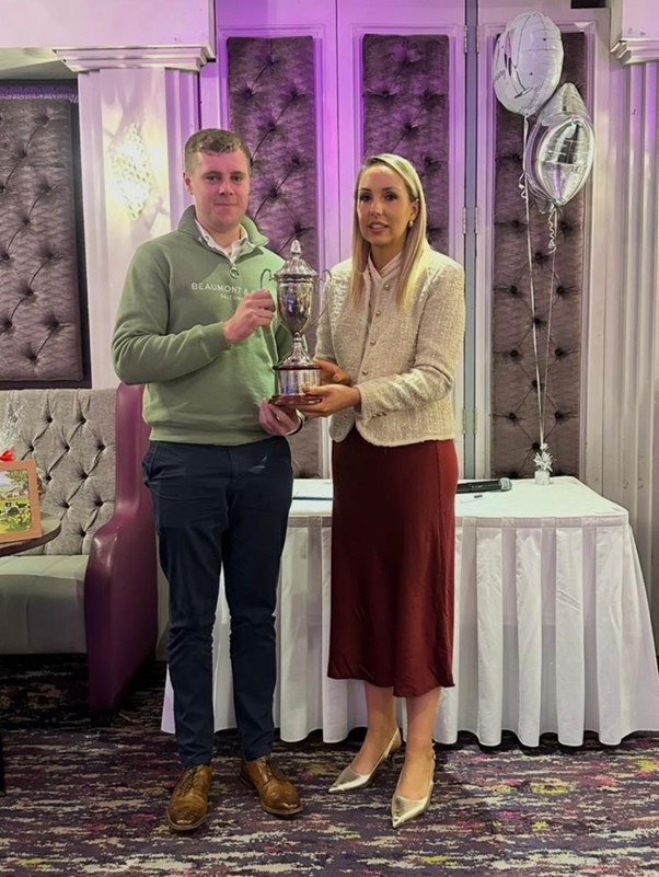 Overall Champion Herd - Mervyn Robinson (herd manager from Cherryvalley Estate) with judge Amelda Middleton Leonard