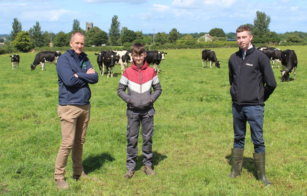 (l-r) Co. Offaly dairy farmer, John Gill, with his son and Niall Nolan, InTouch nutritionist. Source: KEENAN