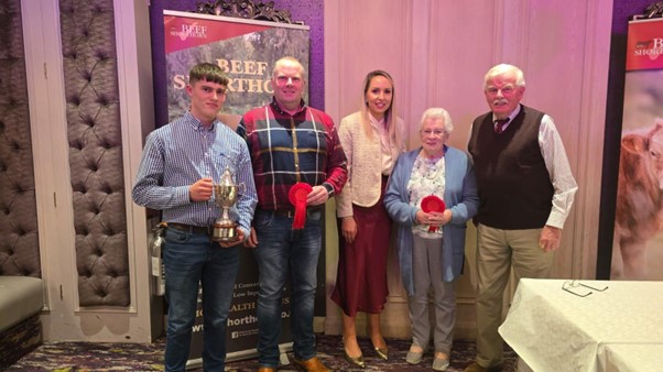 Champion Commercial Herd –  Fitzsimons Family, pictured with Judge Amelda Middleton Leonard