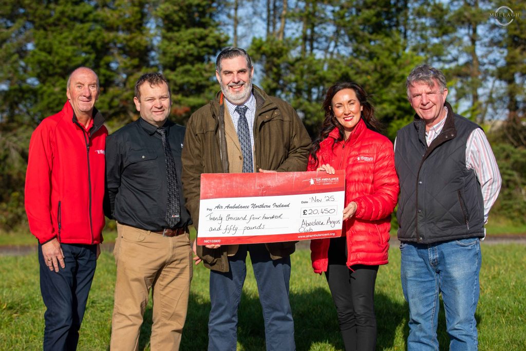 Air Ambulance Northern Ireland representatives Tom Hadden and Kerry Anderson receive a cheque for £20,450 from Alan Morrison, president, and Robert Gilchrist, chief executive, Aberdeen Angus Cattle Society; and Dungannon auctioneer Trevor Wylie. Source: Mullagh Photography