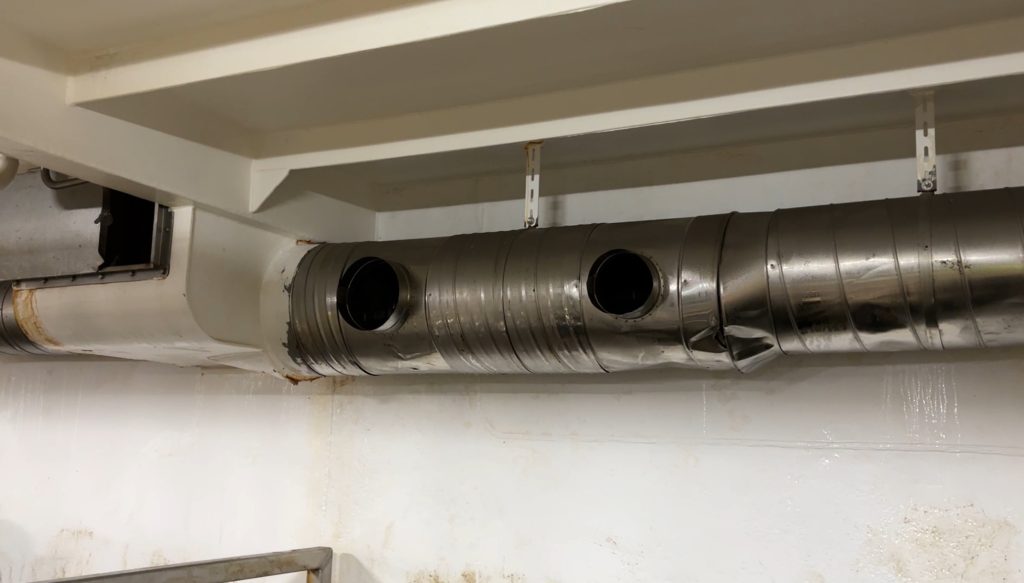 Large ventilation pipes are fitted around each deck