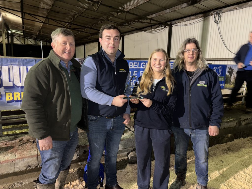 The Meaghers from Roscrea. Co. Tipperary, won the steer category. Pictured with Eoin O'Sullivan from Dawn Meats and Belgian Blue Society president Thomas Doherty