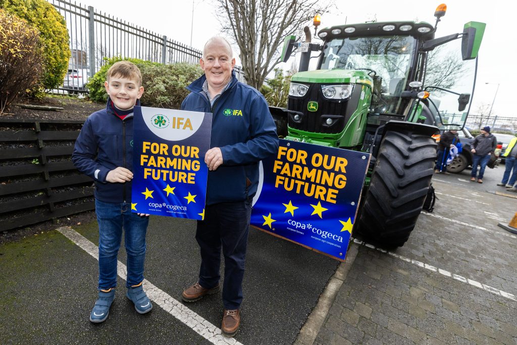 IFA president Francie Gorman with his son Tom pictured before departing on a tractor from the Irish Farm Centre. Source: Finbarr O'Rourk