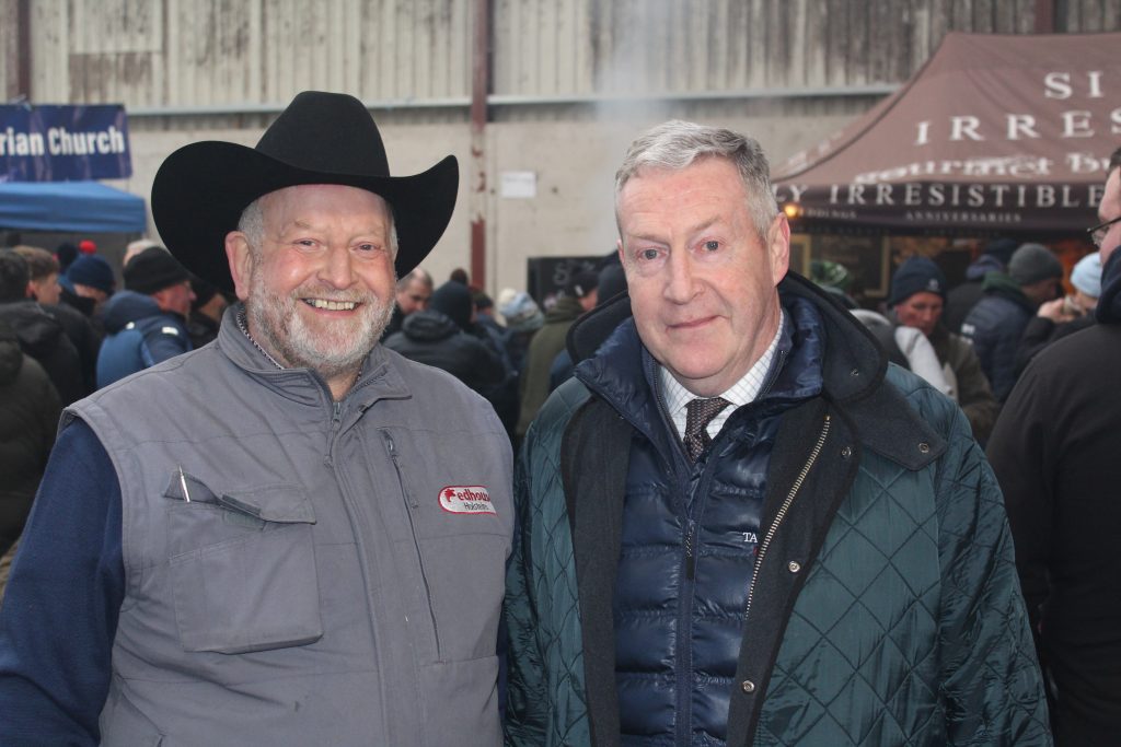 Chatting at the recent Redhouse Holsteins' open day and charity auction, Alan Irwin (host) and auctioneer Michael Taaffe