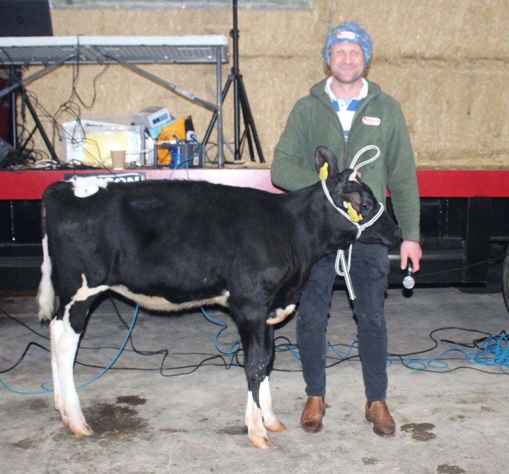 David Irwin, Redhouse Holsteins, with Redhouse 3107 Golley Rud Zip 2 (ET). The four-month-old heifer sold for £9,200 at the recent charity auction held on behalf of Northern Ireland Air Ambulance
