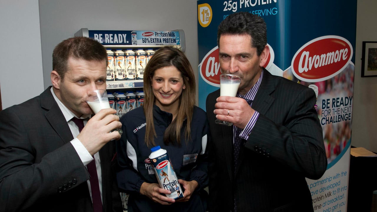 Dessie Farrell, CEO of the GPA and Mags D'Arcy, Wexford Camogie player with Michael McArdle, Commercial Director for Glanbia Consumer Foods.
