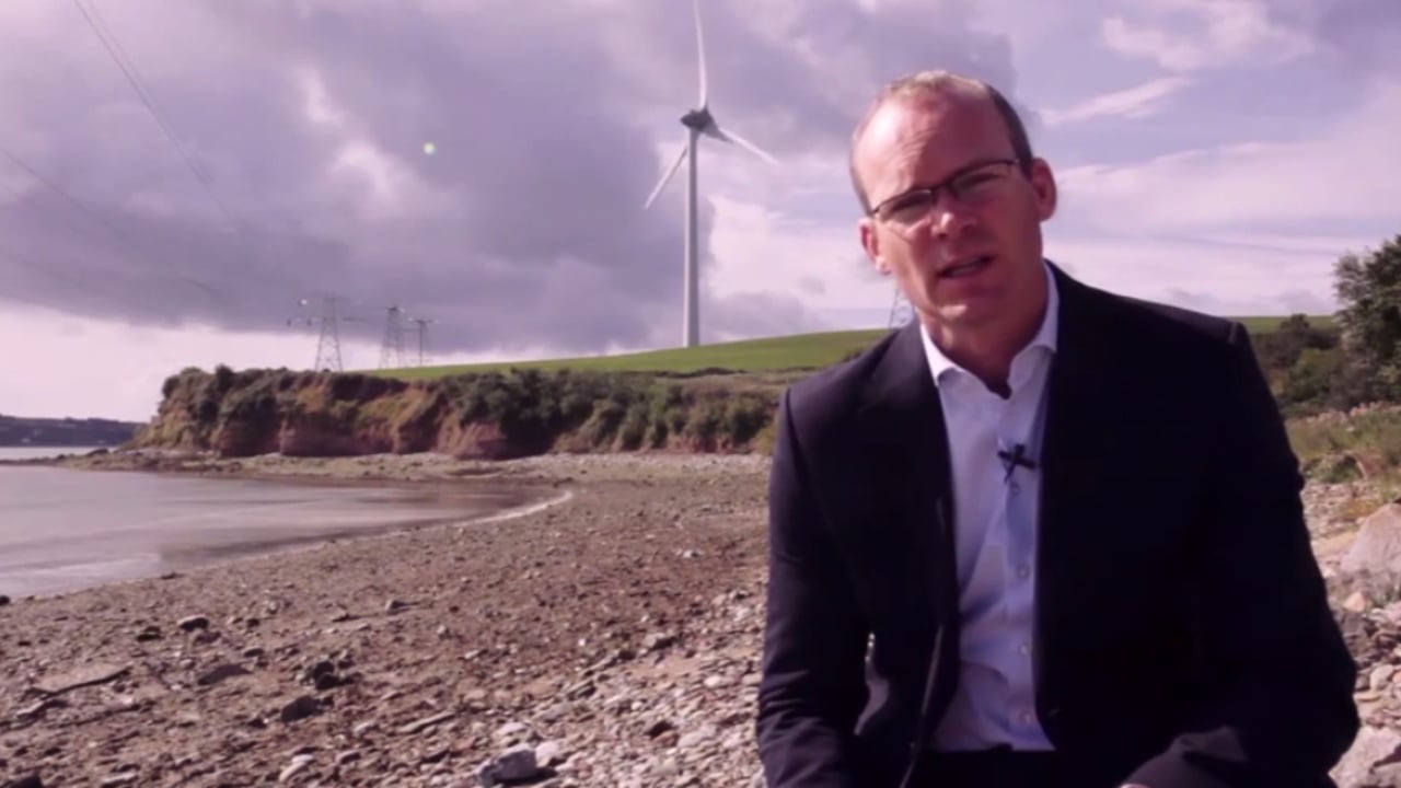 Minister Coveney in Cork where he shot his August video update. 