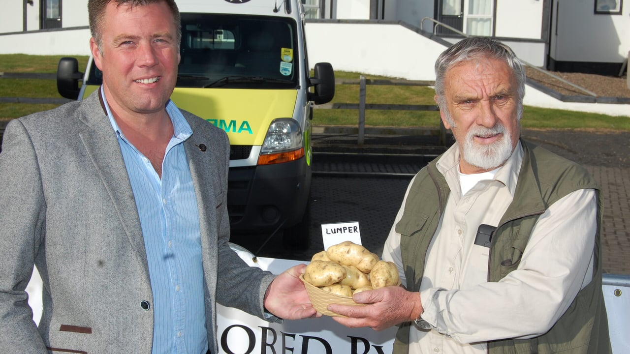 Michael McKillop, from Glens of Antrim Potatoes, and David Langford, from Co Mayo, with a sample of Lumper potatoes