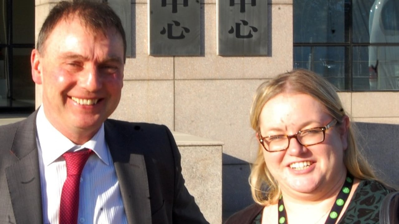 ICMSA President John Comer chatting with Glanbia's Fiona O'Toole as they
arrive at the Sanyuan Food Group factory near Beijing.