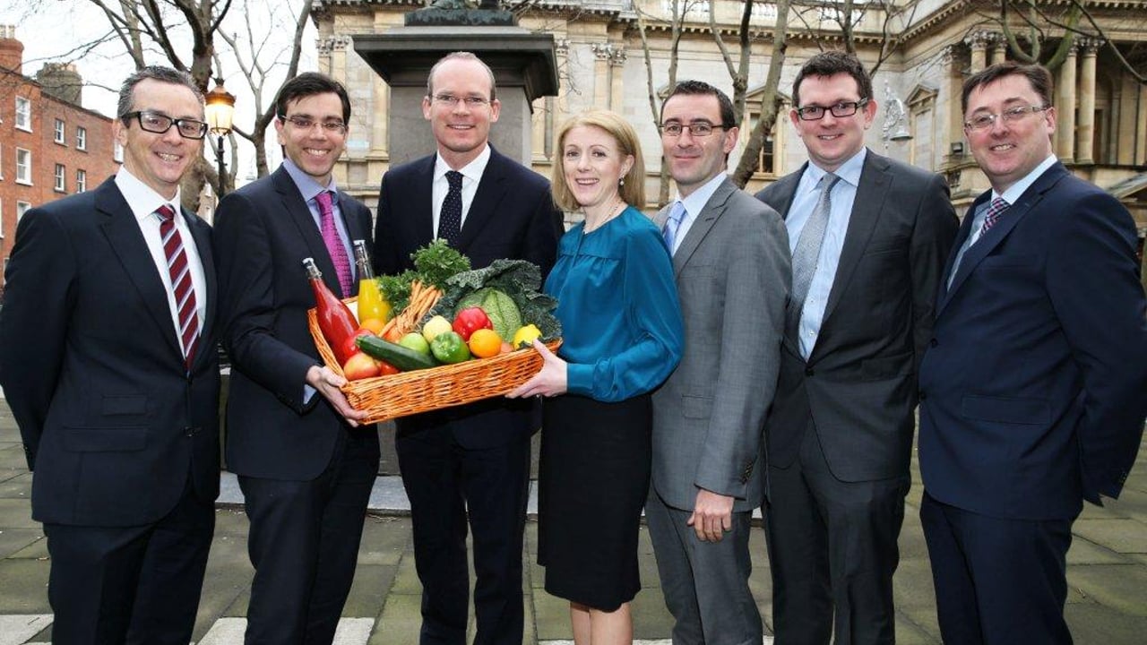 Minister for Agriculture  Simon Coveney with the Ulster Bank Food and Drink team.  