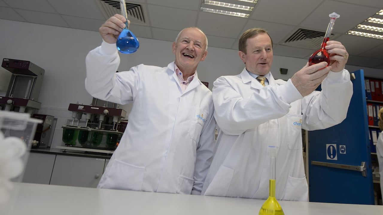 Chanelle Group MD Mr Michael Burke and An Taoiseach Enda Kenny review samples in the Chanelle lab, Loughrea , Co. Galway
