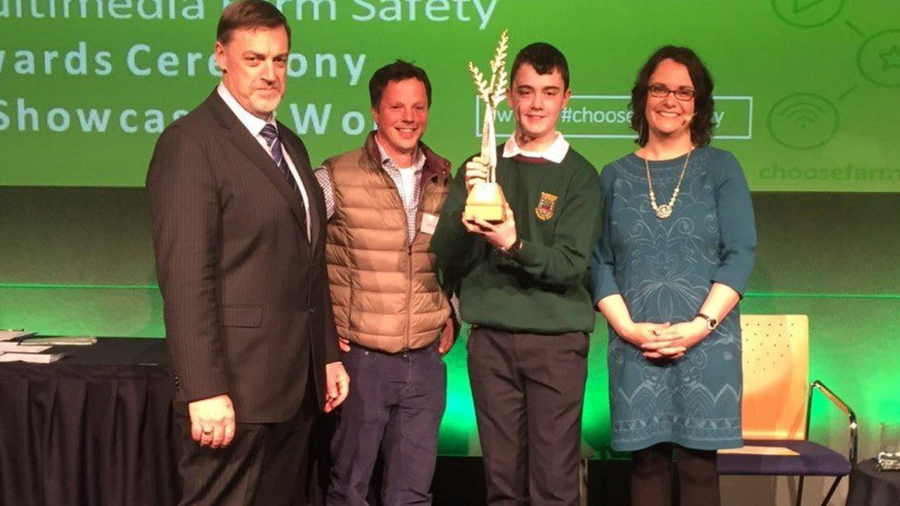 Shane Farrelly is presented with his award at the HSA Multimedia Competition