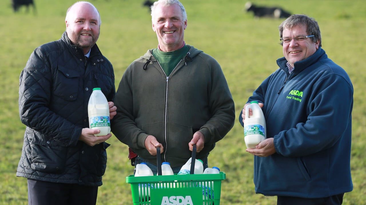 Jason Hempton, Commercial Director of Branded Products at Dale Farm, Dale Farm Dairy Farmer and Michael McCallion, Asda’s Head of Local Sourcing for Northern Ireland.