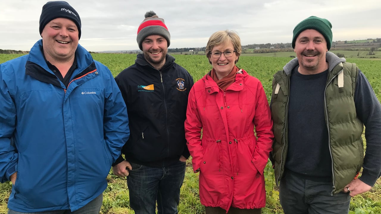 L-R: Robbie Byrne, Co. Louth; Louis McAuley, Co. Meath; Mairead McGuinness; and Garreth Culligan, Co. Louth, in a field of mustard sown with beans and oats