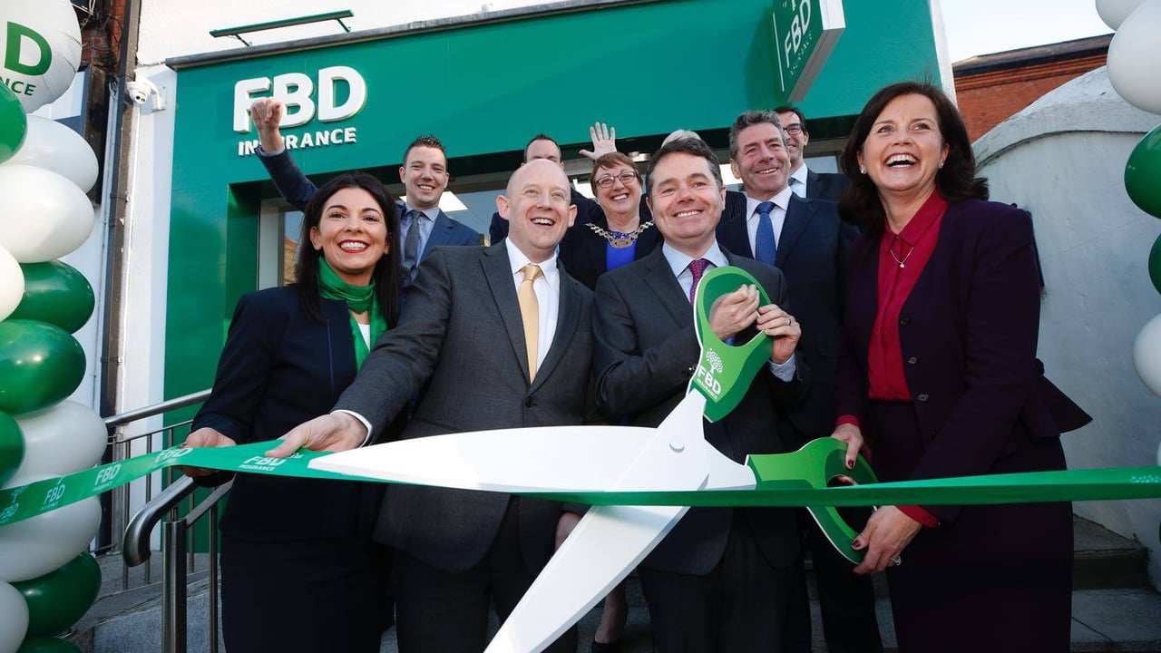 The Minister for Finance and Public Expenditure and Reform, Paschal Donohoe cuts the ribbon on the new sales office with FBD CEO Fiona Muldoon