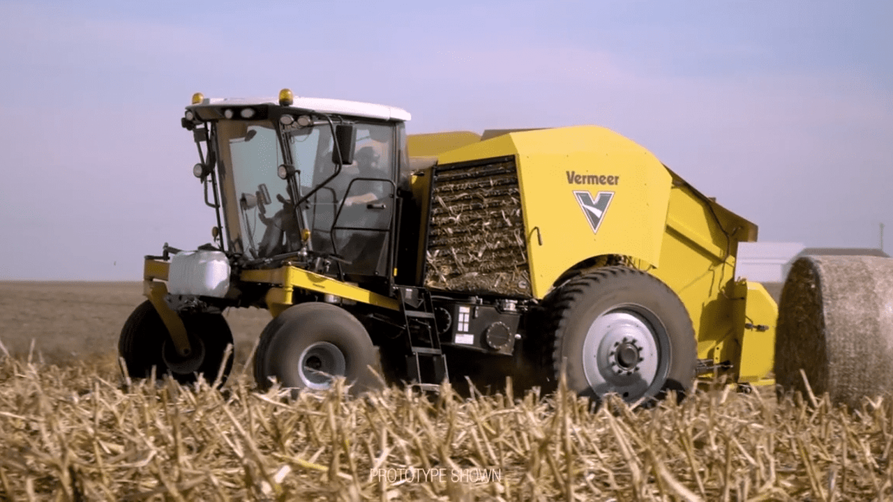 Self-propelled round baler moves on...to maize stalks