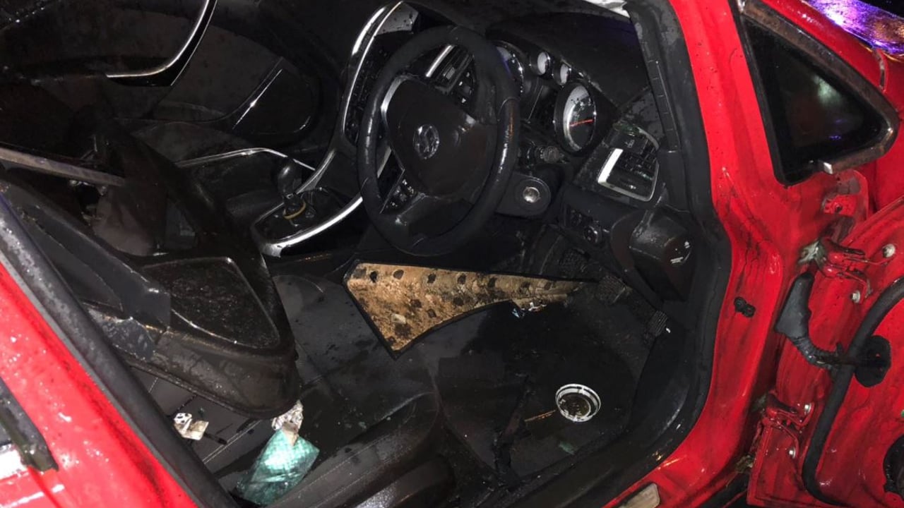 Pics: Car filled with pig slurry after collision with tanker