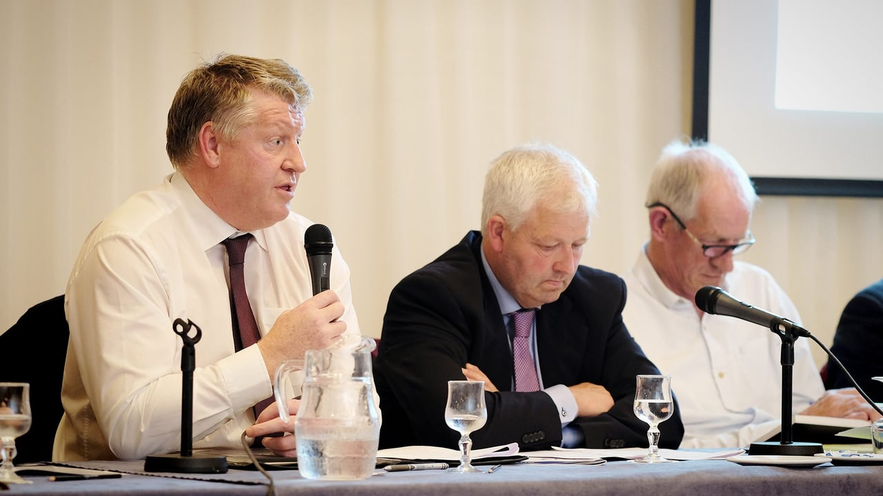 Arrabawn CEO Conor Ryan addressing the co-op’s AGM, flanked by chairman Sean Monahan and secretary Jerry Ryan. Image source: Tom Doherty