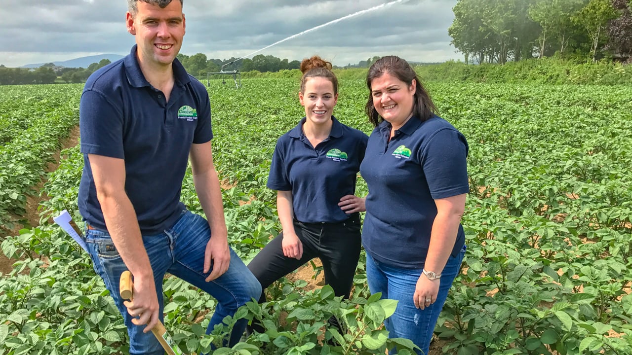 Thomas Murray, Anne Dunphy and Elaine Kenny keeping out of the line of the irrigator