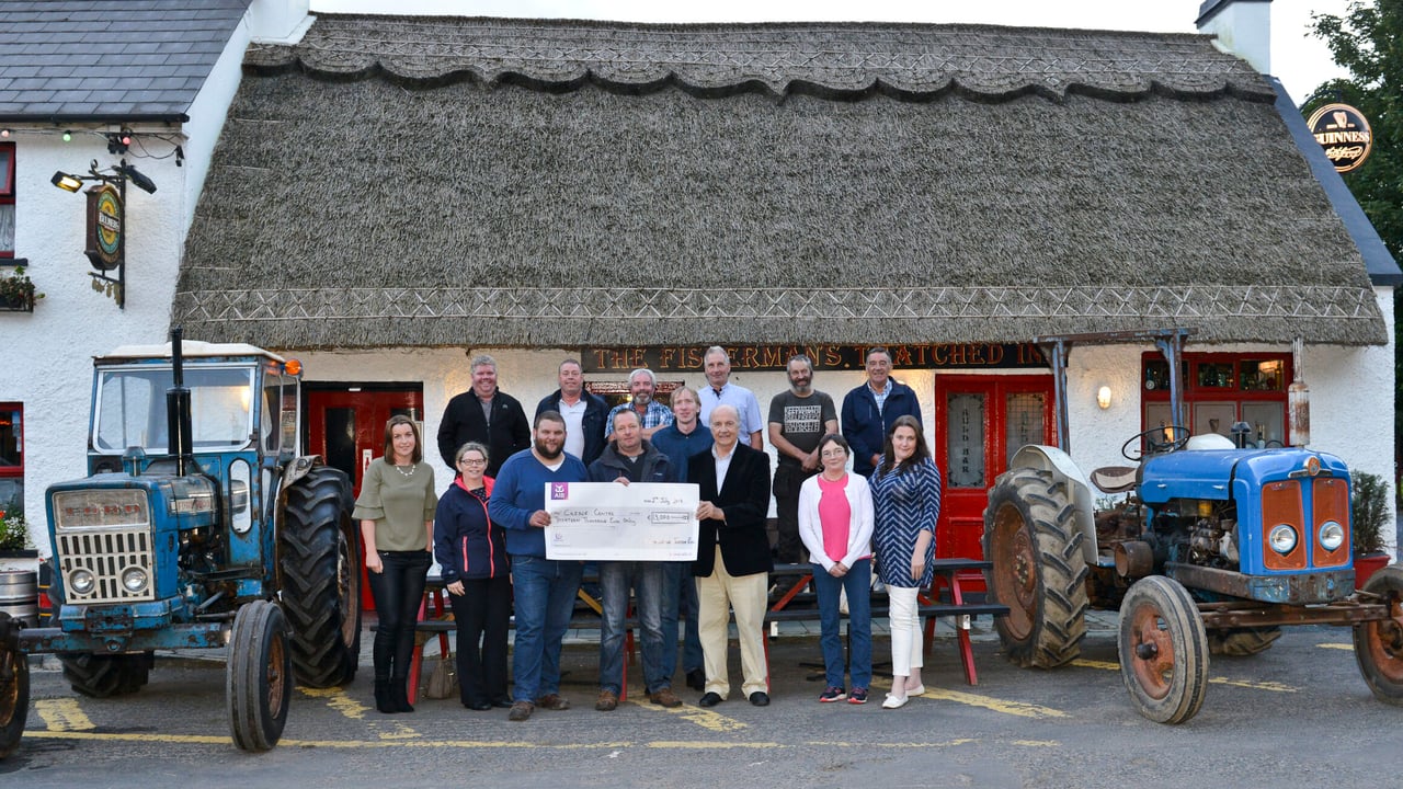 Organisers of the  Fisherstown Tractor Run present a cheque for €13,000 to the Cuisle Cancer Support Centre.
Photo: Pat Buckley