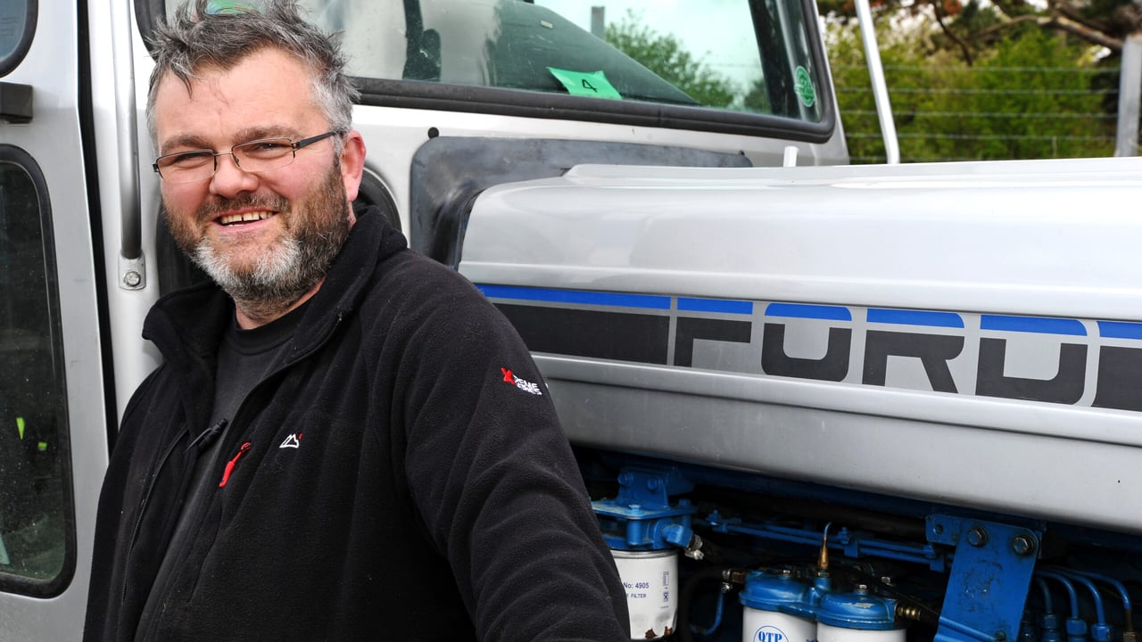 Colm Clifford pictured with his treasured Ford 7810 Silver Jubilee