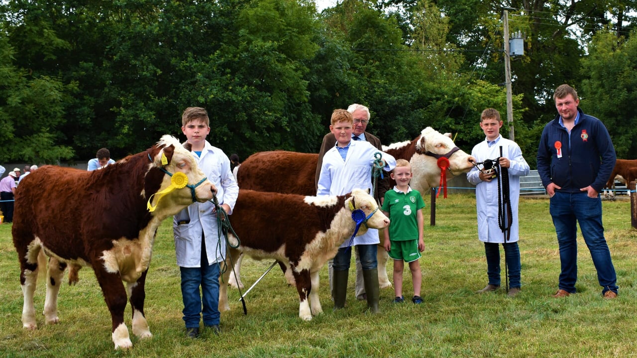 Winners of the Junior Young Handler class: R-L: Judge Shane O’Brien; first-place winner Liam O’Dwyer; second-placed winner John O’Dwyer; and third-place winner John Angland. IHBS president Martin Murphy and his grandson are pictured in the centre