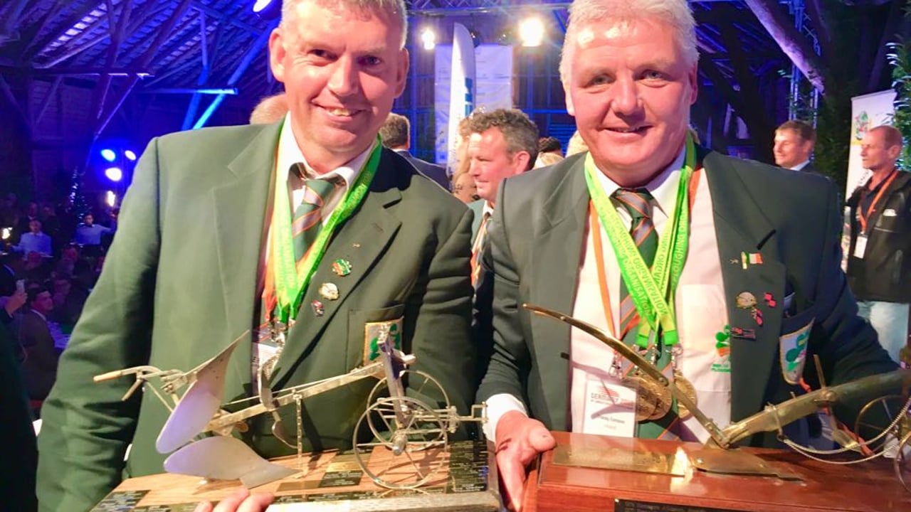 New world ploughing conventional champion Eamonn Tracey from Carlow and silver place reversible winner John Whelan from Wexford