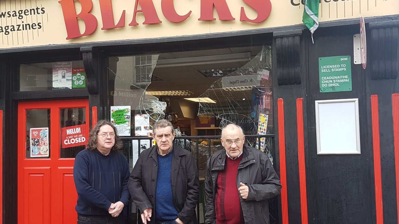 Malachy, Myles and Brian O'Brien outside the family shop on Main Street, Cavan