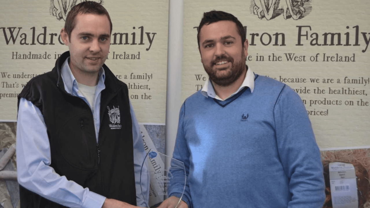 Darragh Waldron and Ciaran Kiveney with the Blas na hEireann gold award